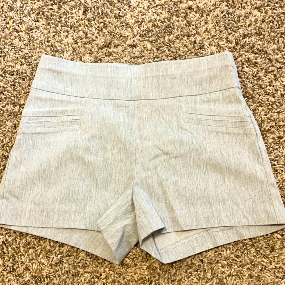 The shorts are light gray and they are a size small.